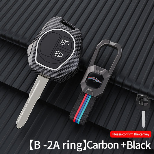 Suzuki Swift | Dzire | WagonR | Brezza | Grand Vitara | Fronx | Jimny | XL6 | Ignis | Ertiga | Baleno | Vitara Brezza | Celerio | Alto | Ciaz | S-Cross Luxury Premium Metal Carbon Fiber Car Key Cover With Key Chain( 2 buttons )